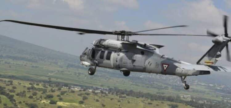 Con helicóptero artillado, militares repelen agresión a tiros en Michoacán Con helicóptero artillado, militares repelen agresión a tiros en Michoacán