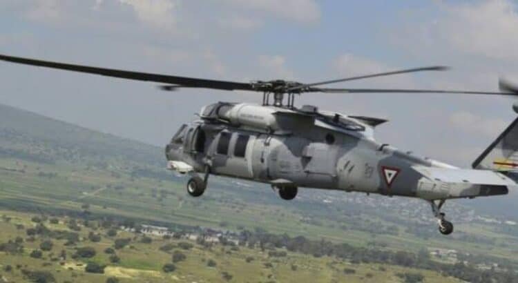 Con helicóptero artillado, militares repelen agresión a tiros en Michoacán