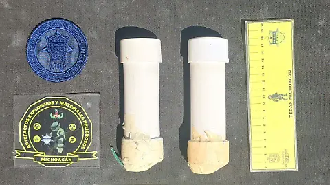 Desactiva Guardia Civil dos explosivos en marcha de normalistas en Morelia